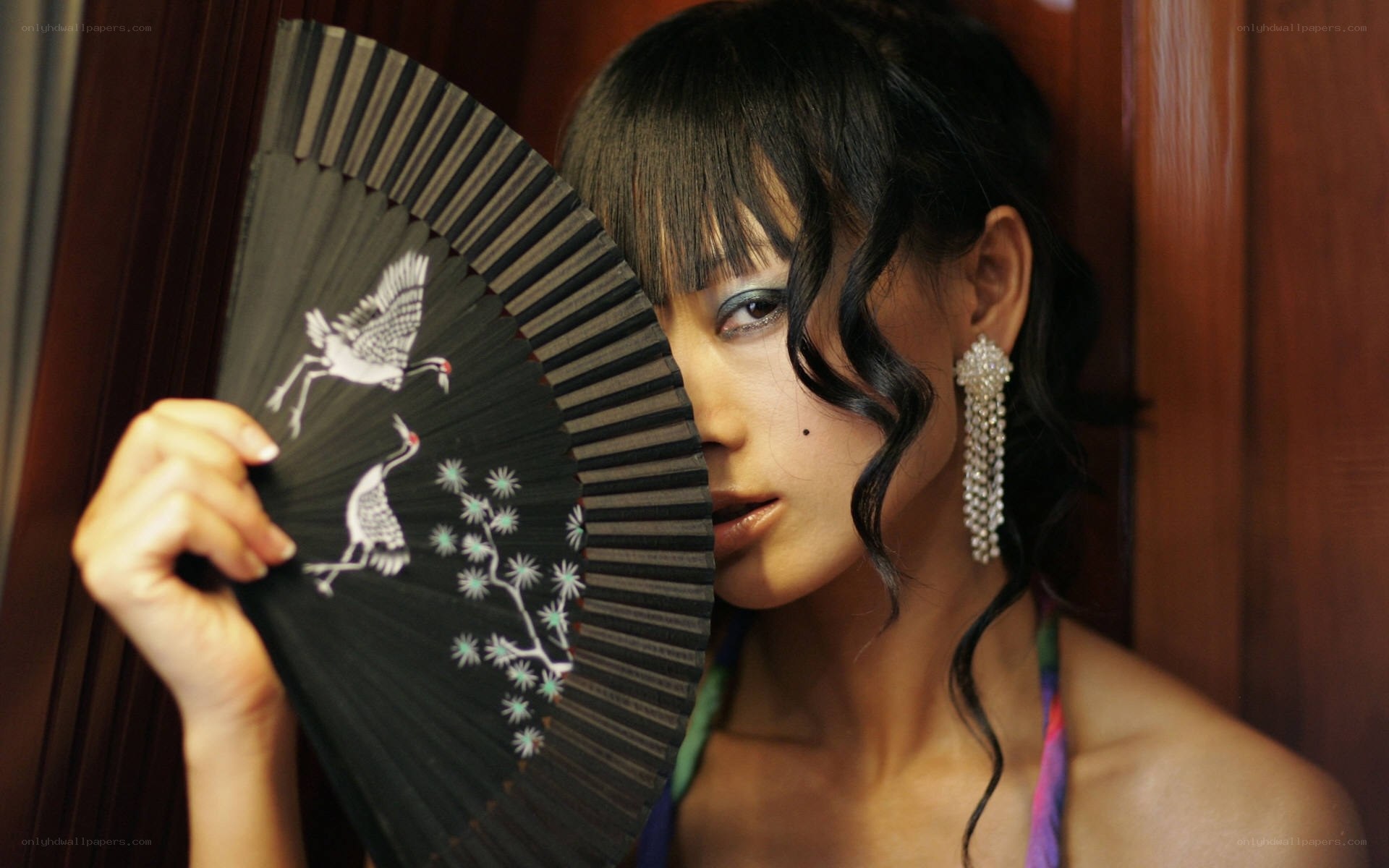 woman with decorative fan