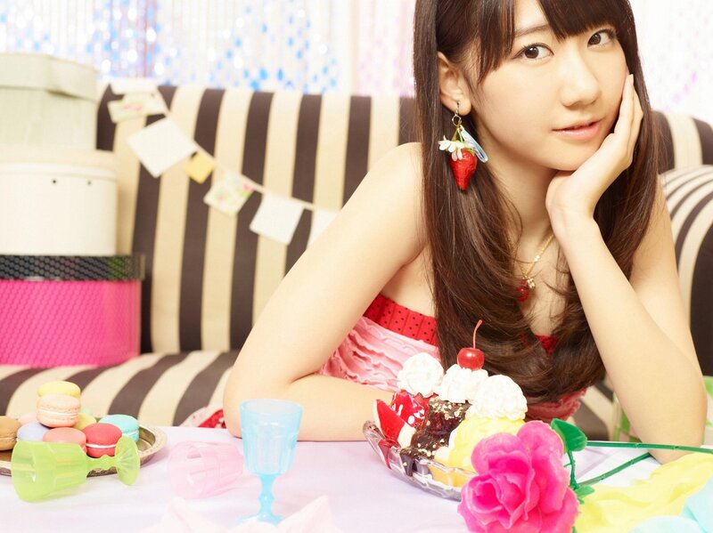 woman with dessert at table