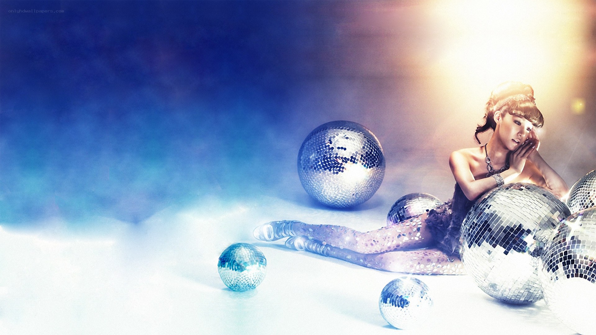 woman with disco balls