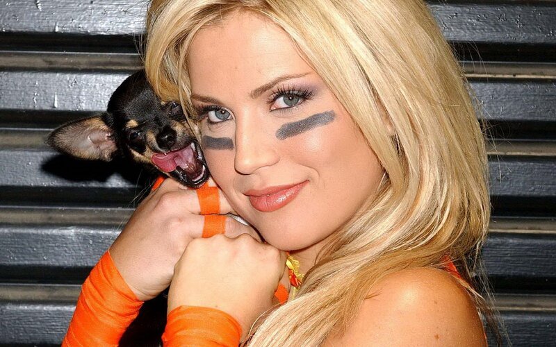 Woman with dog and face paint