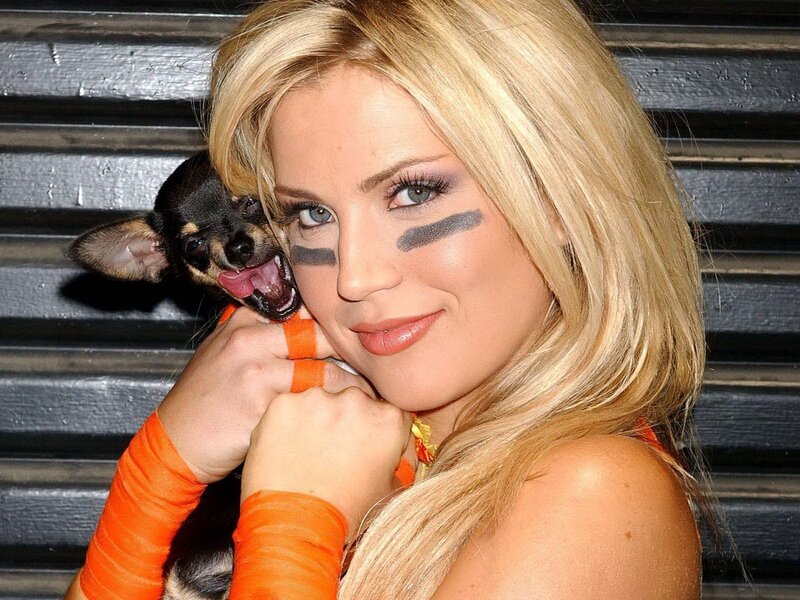 Woman with dog and face paint