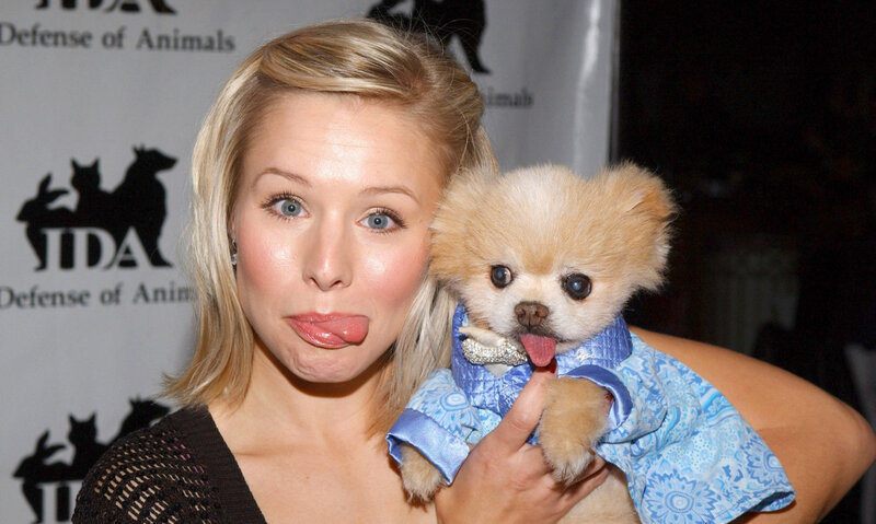 woman with dog at event