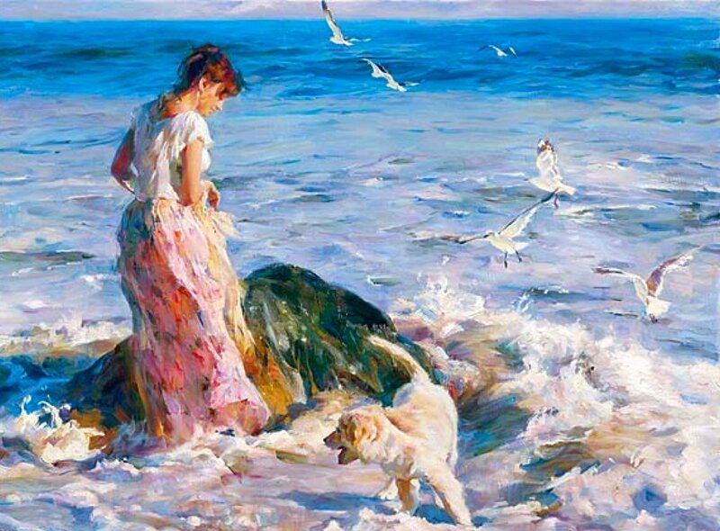 Woman with dog at the seashore