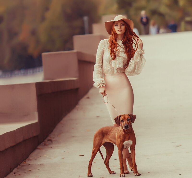 Woman with Dog — Brown