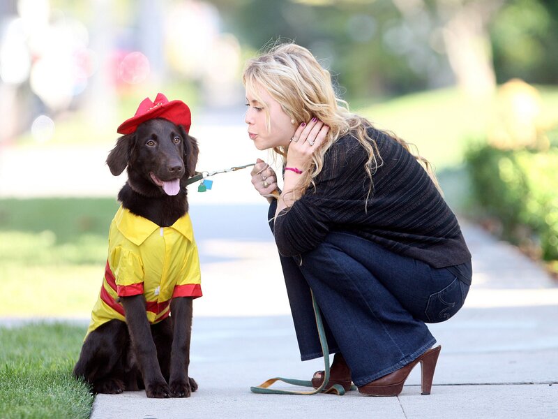 Woman with dog in costume
