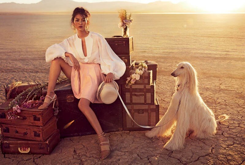 Woman with Dog in Desert