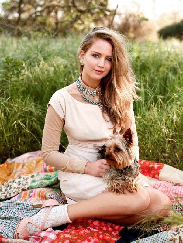 Woman with dog in field