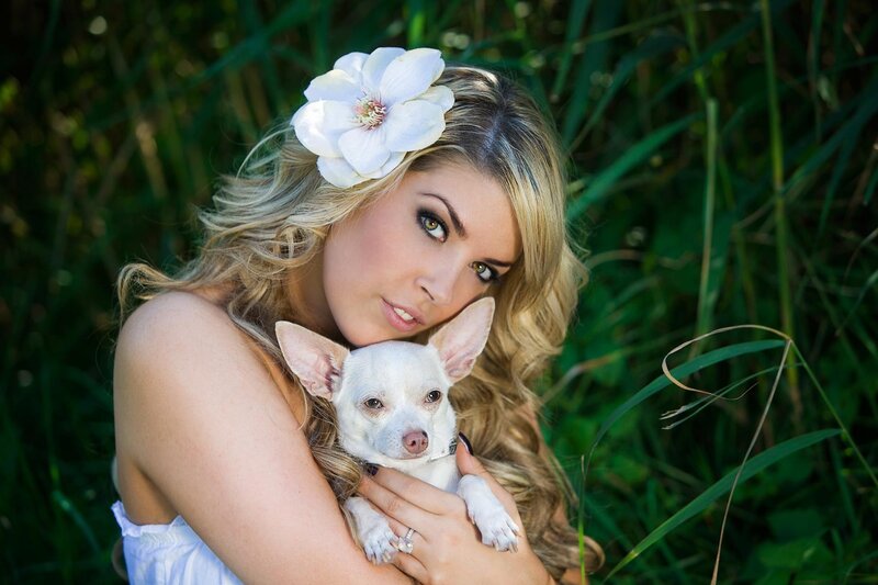 woman with dog in field