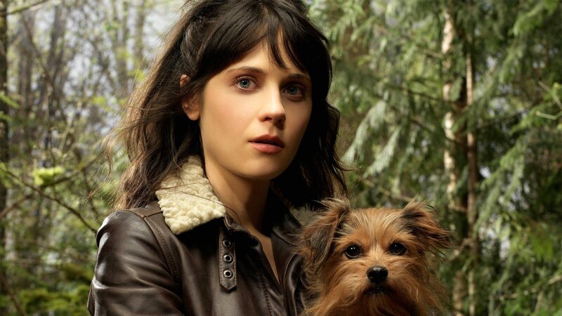 woman with dog in forest