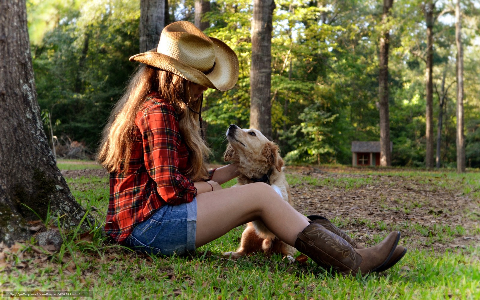 Woman with dog in forest