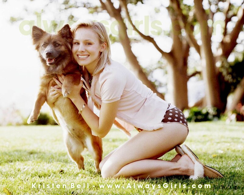 Woman with dog in garden