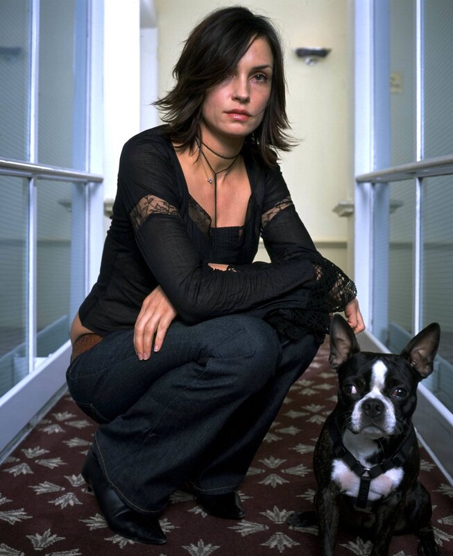 woman with dog in hallway