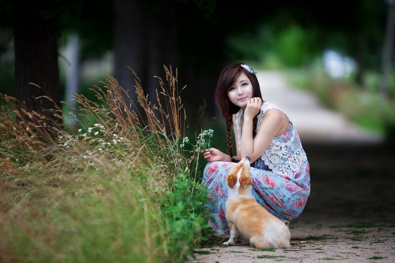 Woman with dog in park