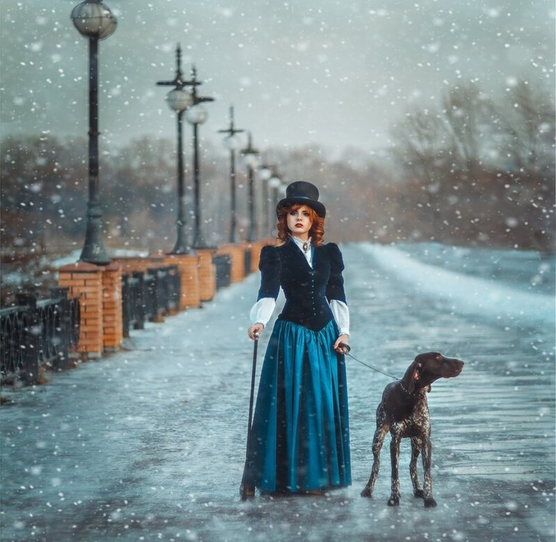 Woman with Dog in Snow — Blue