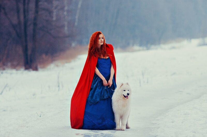 Woman with Dog in Snow — Red