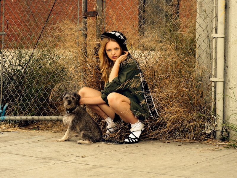 Woman with dog in urban setting
