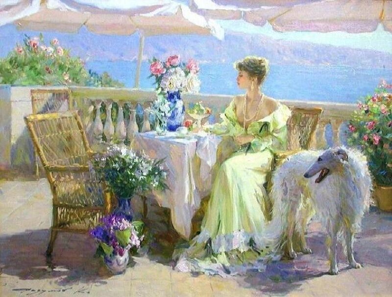 Woman with dog on balcony