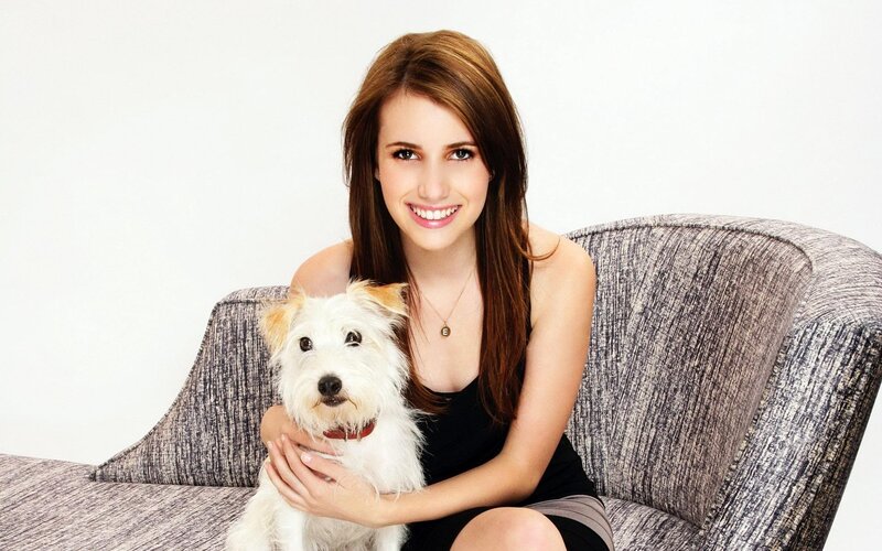 woman with dog on couch