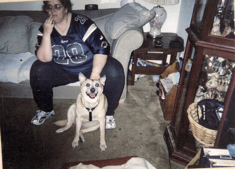 woman with dog on couch