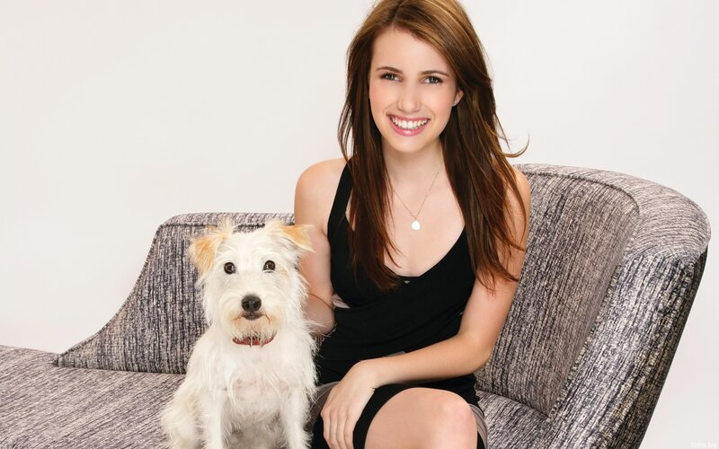 Woman with dog on couch
