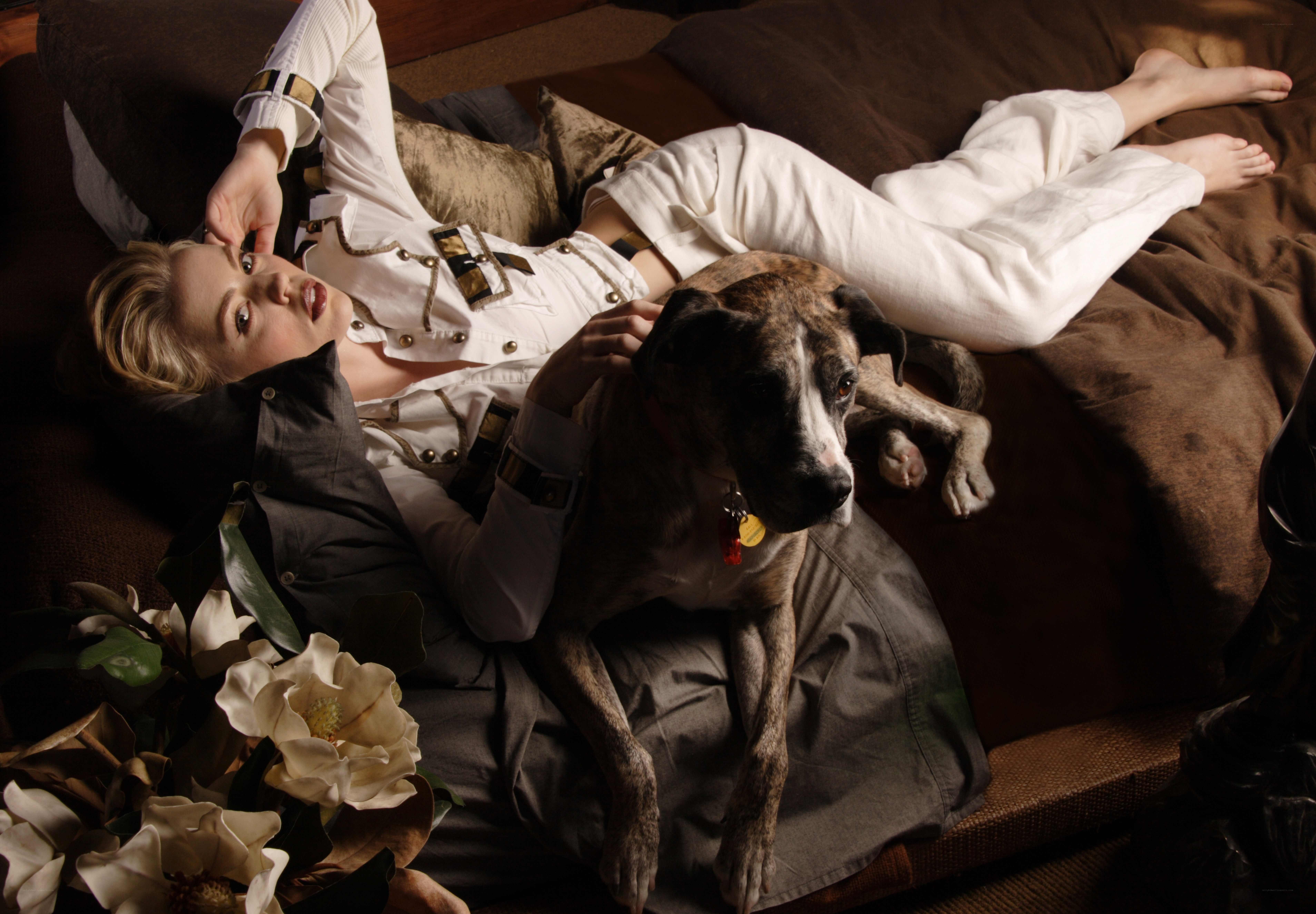 woman with dog on couch