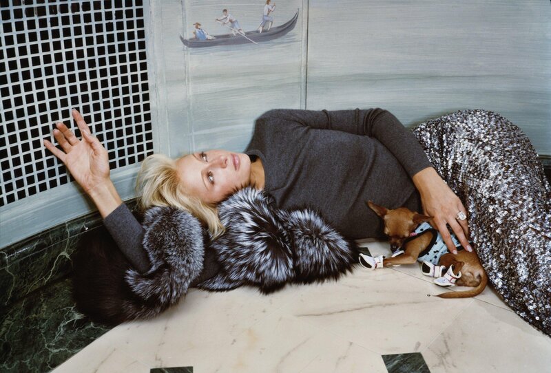 Woman with dog on floor