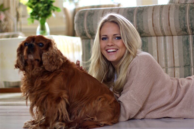 Woman with dog on floor