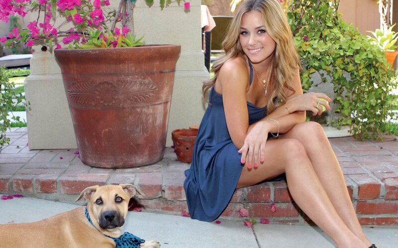Woman with dog on patio