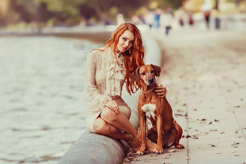 Woman with Dog on Pier