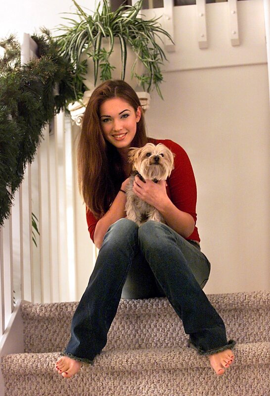 Woman with dog on stairs