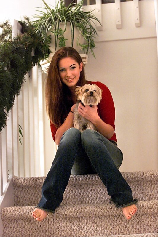woman with dog on stairs