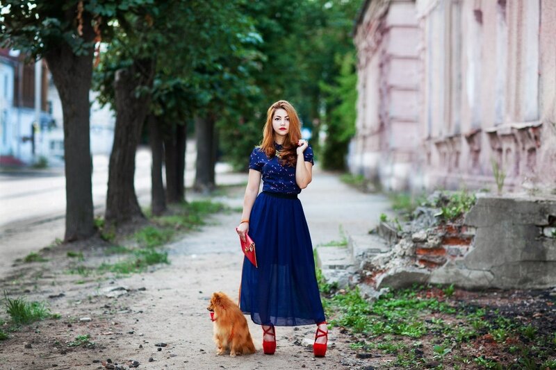 Woman with Dog on Street — Blue, Dramatic