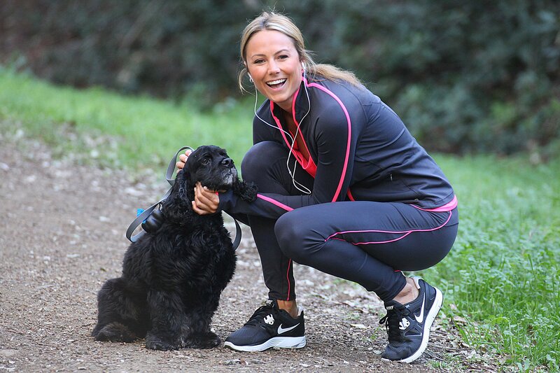 Woman with dog on trail
