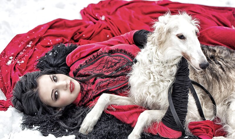 Woman with Dogs in Snow — Red