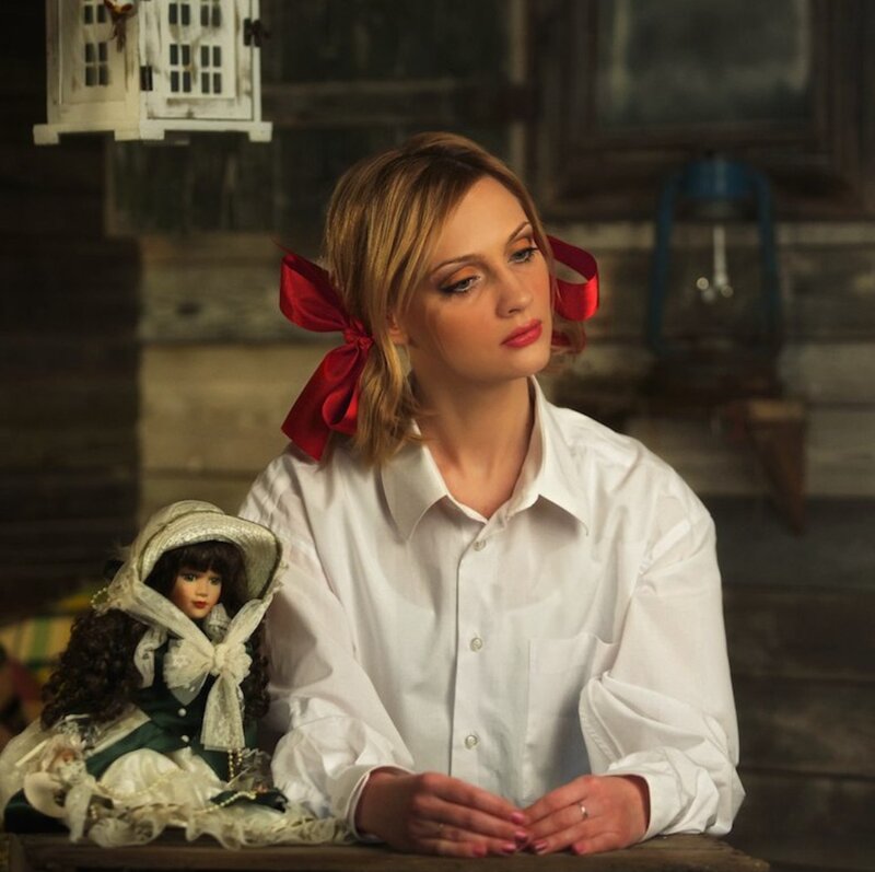 Woman with Doll