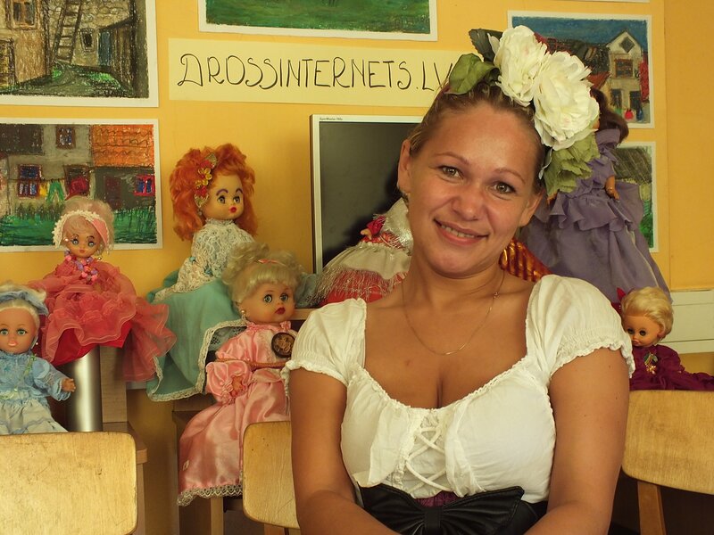 Woman with Dolls