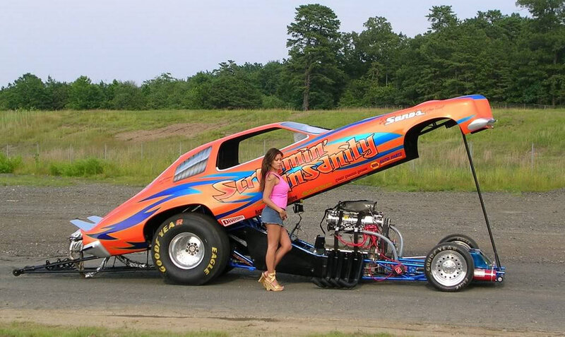 Woman with Drag Racing Car — Orange