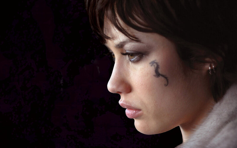 woman with dragon tattoo
