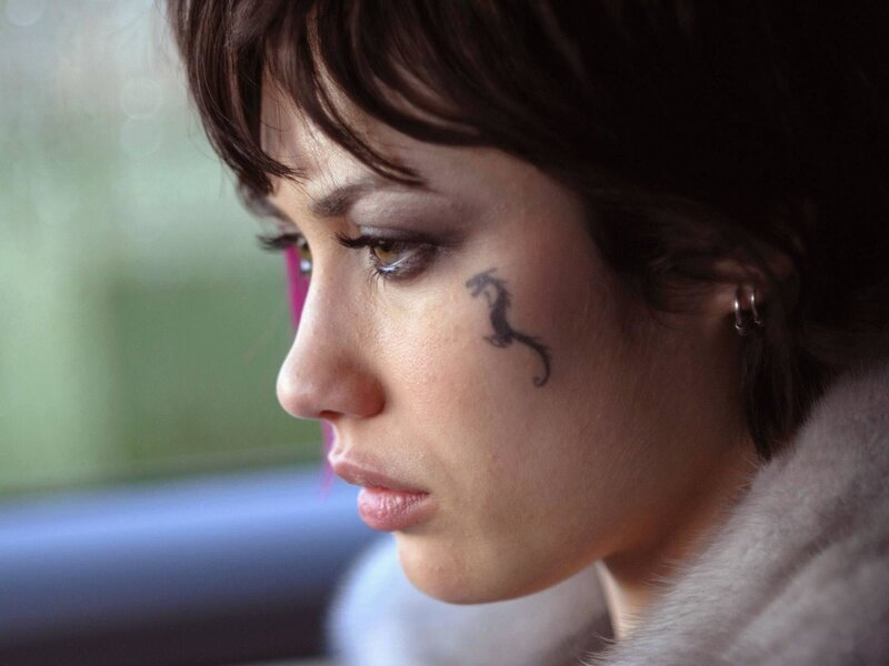 woman with dragon tattoo