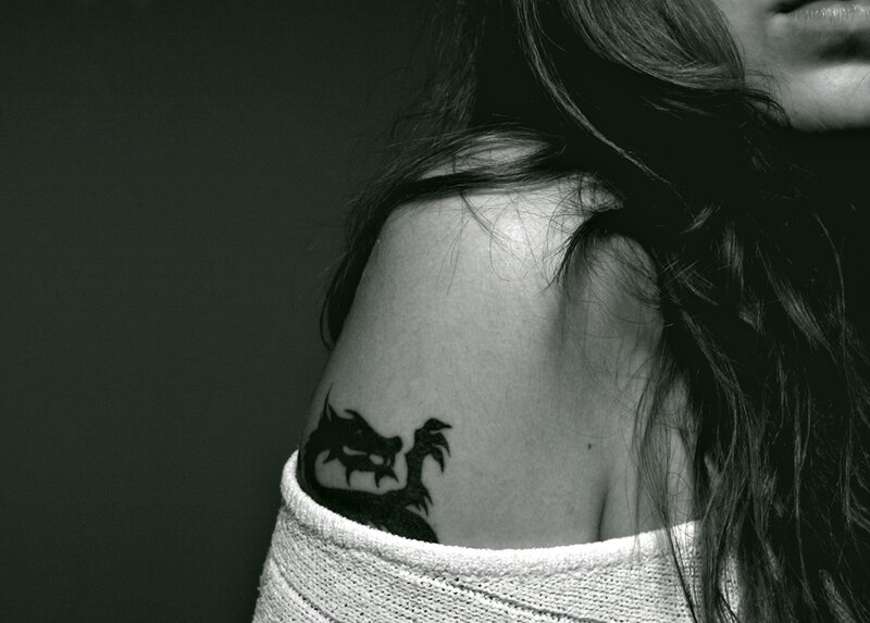 woman with dragon tattoo