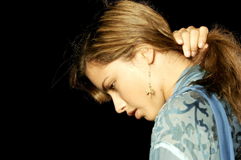 woman with dragonfly earring