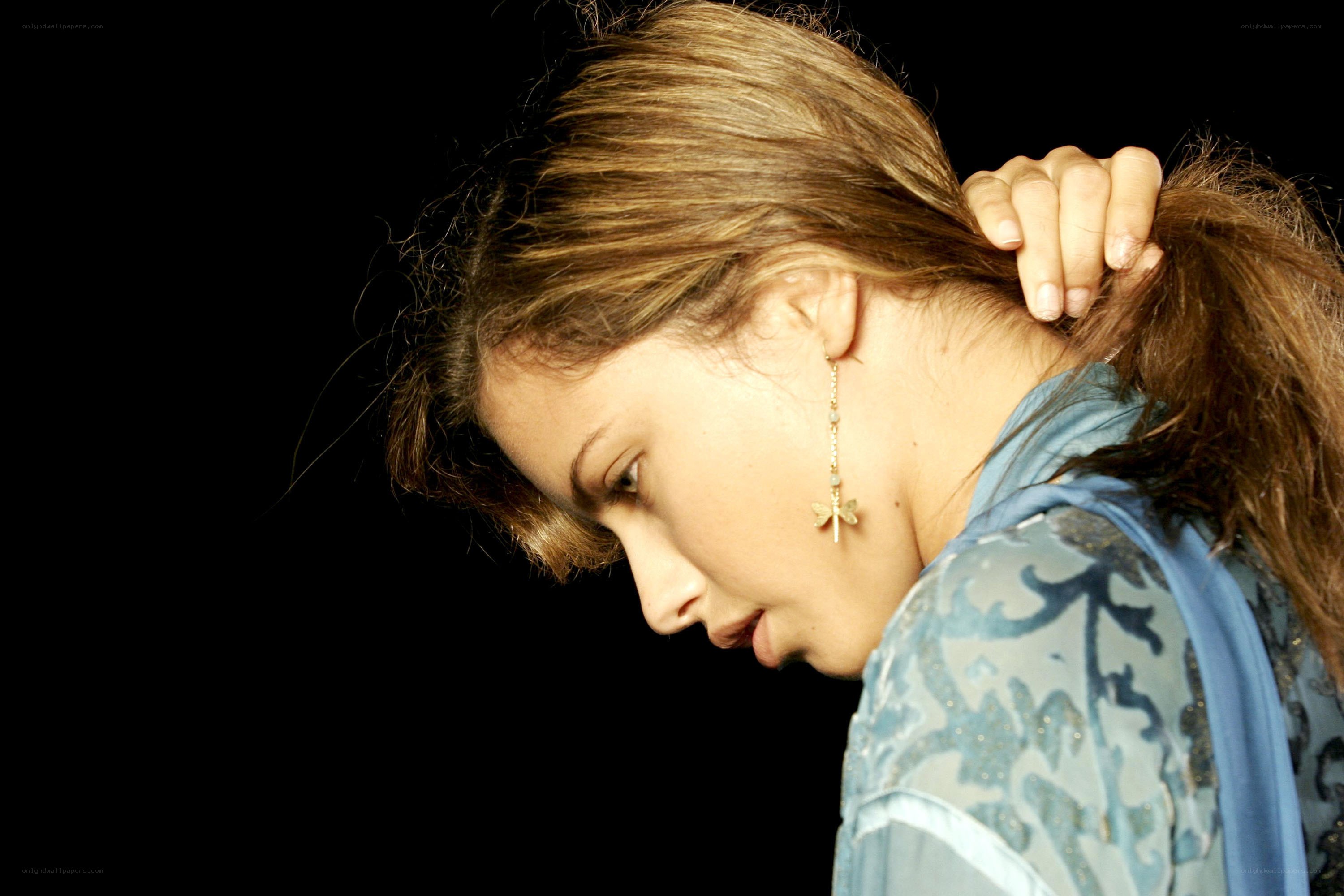 woman with dragonfly earring