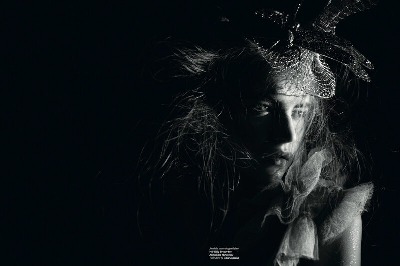 woman with dragonfly hat