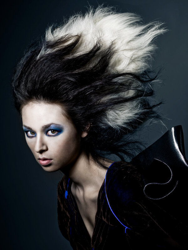 woman with dramatic hair and makeup