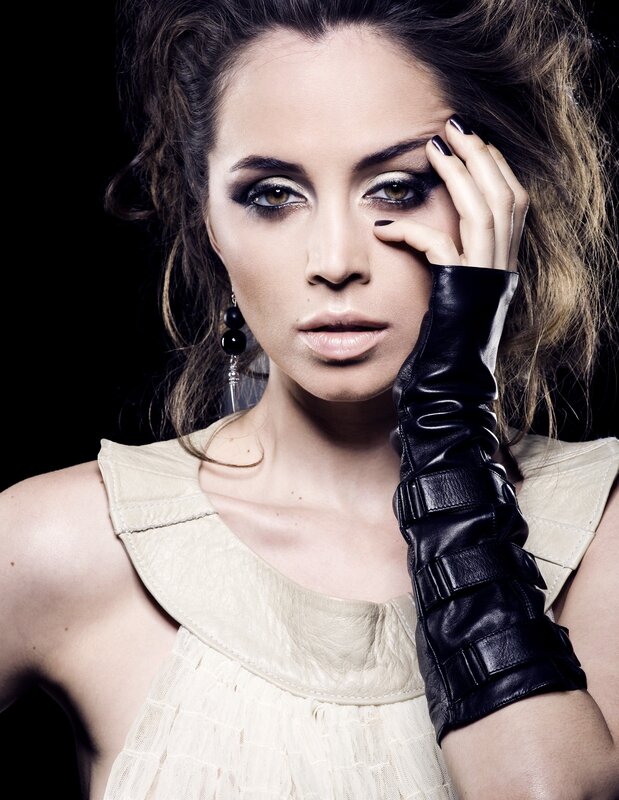 woman with dramatic makeup and black glove