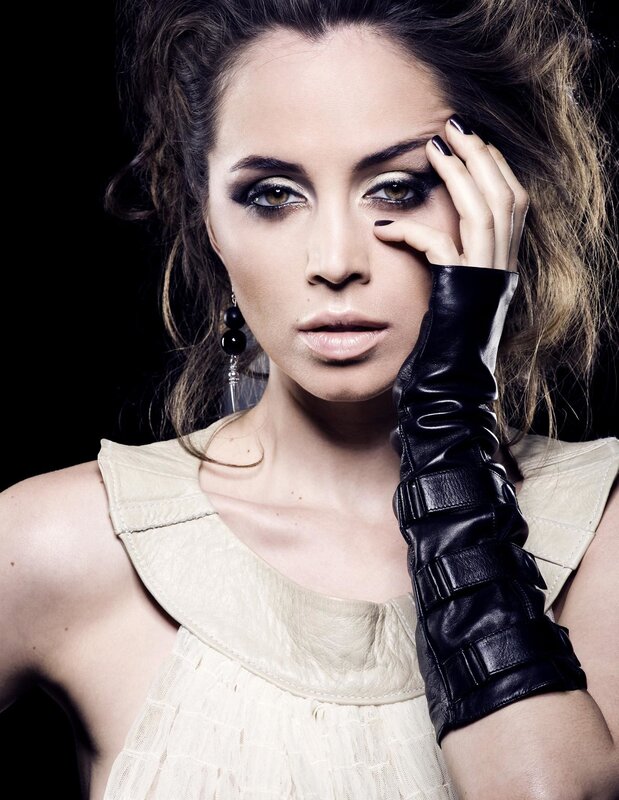 woman with dramatic makeup and black glove