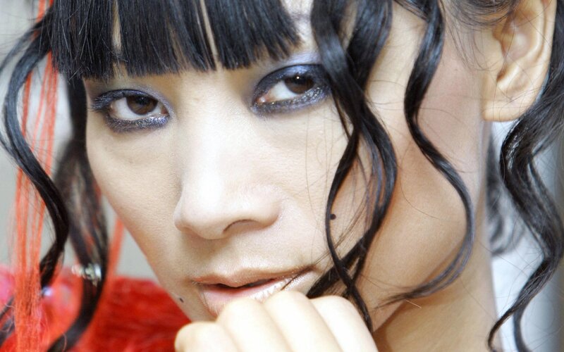 woman with dramatic makeup and black hair