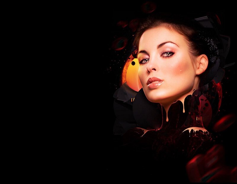 woman with dramatic makeup and dark background
