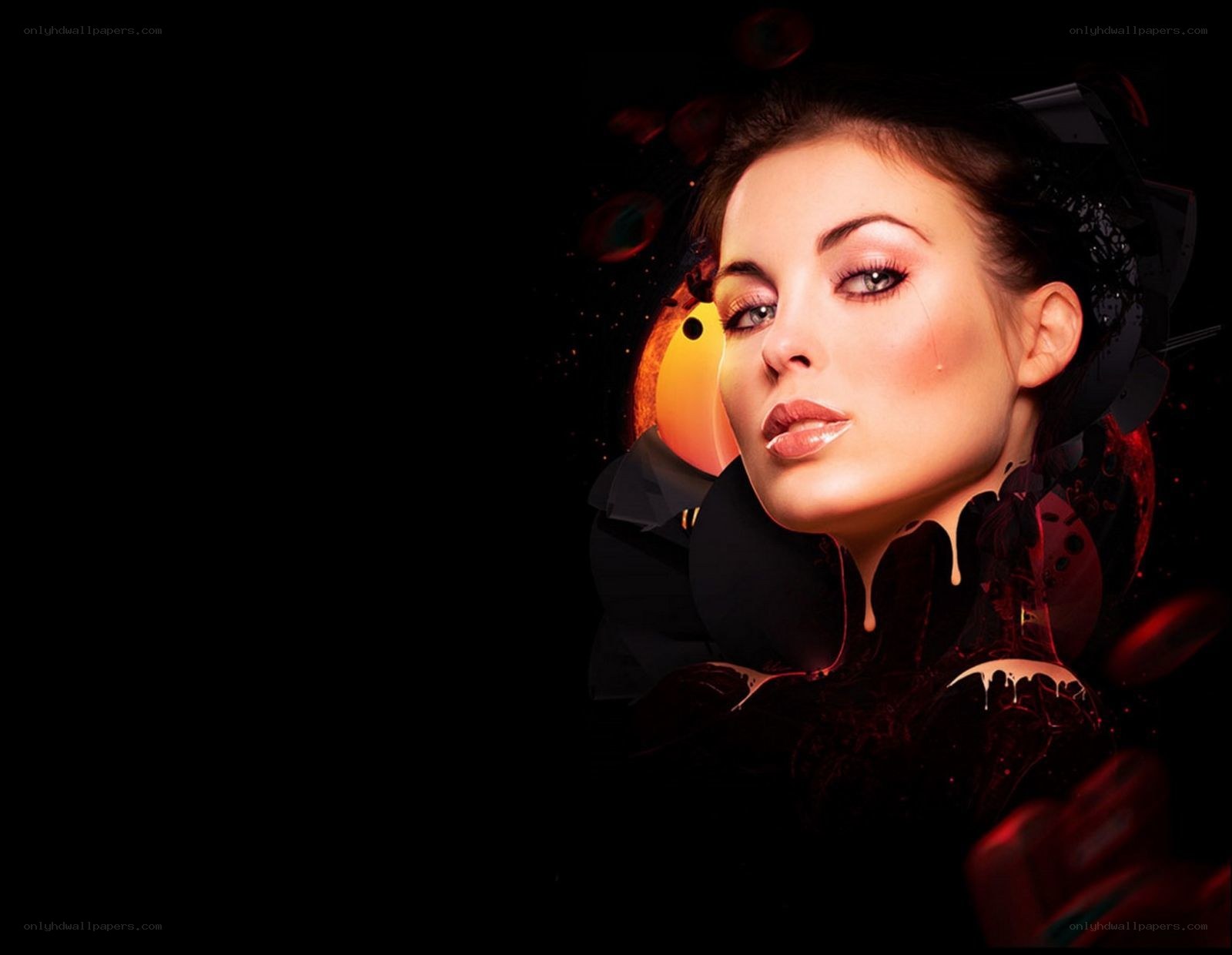 woman with dramatic makeup and dark background