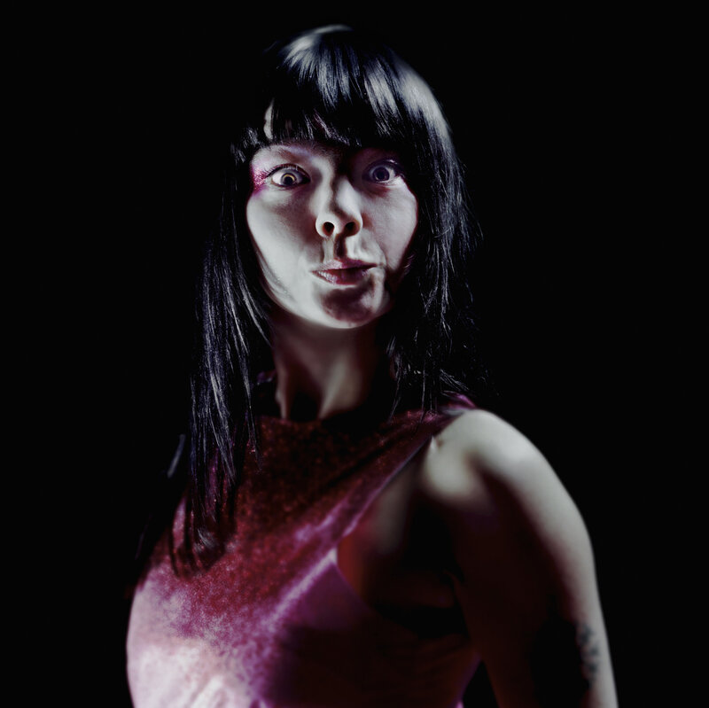 woman with dramatic makeup and dark hair